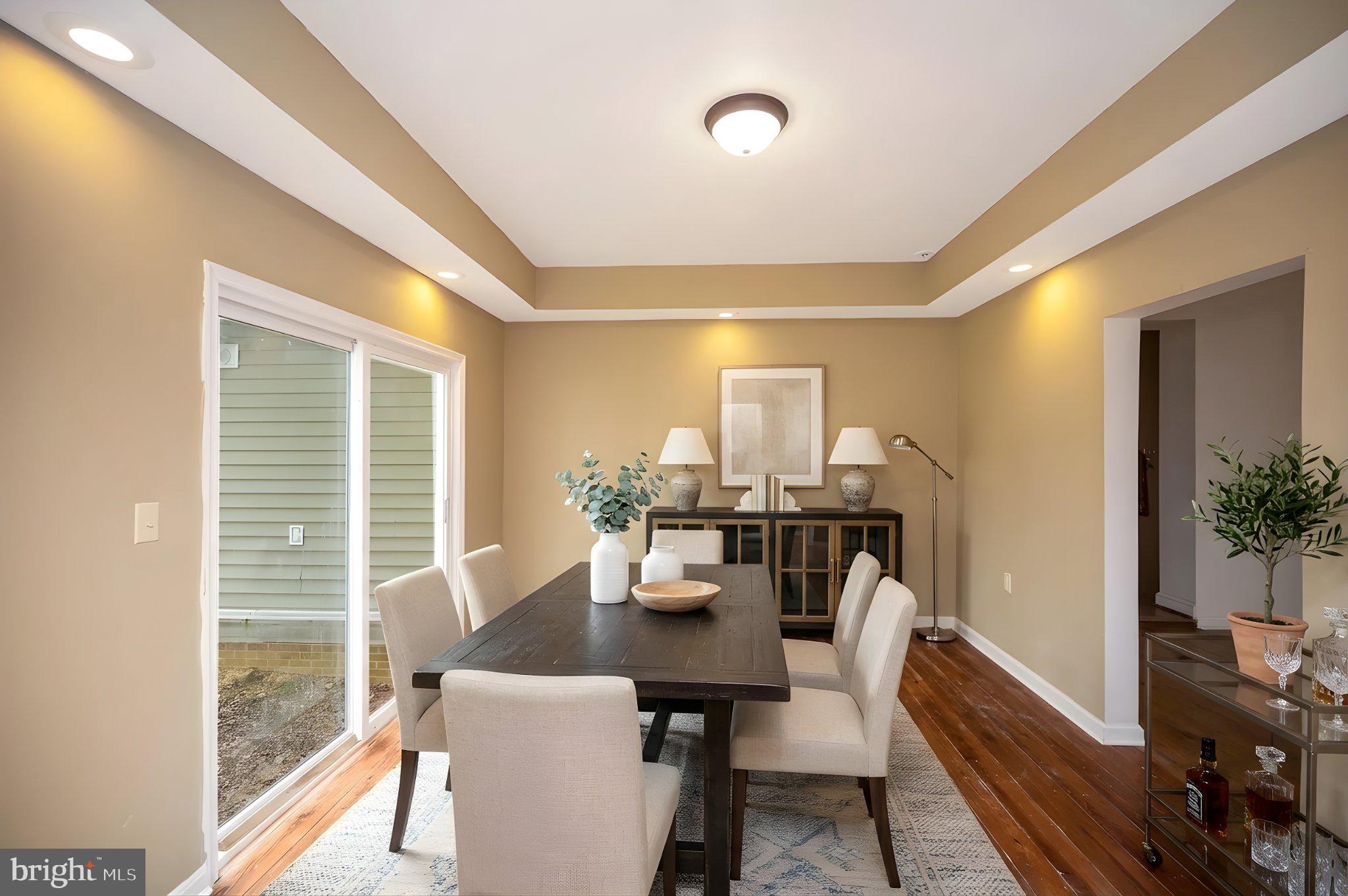 23202 Village Road Unionville, VA 22567 - Photo 4 of 58 a dining room with furniture window and wooden floor