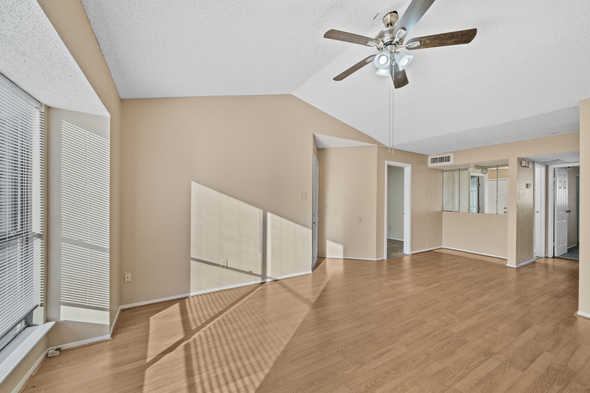 6701 Sands Point Drive, Unit 82 Houston, TX 77074 - Photo 5 of 23 a view of an empty room with a window