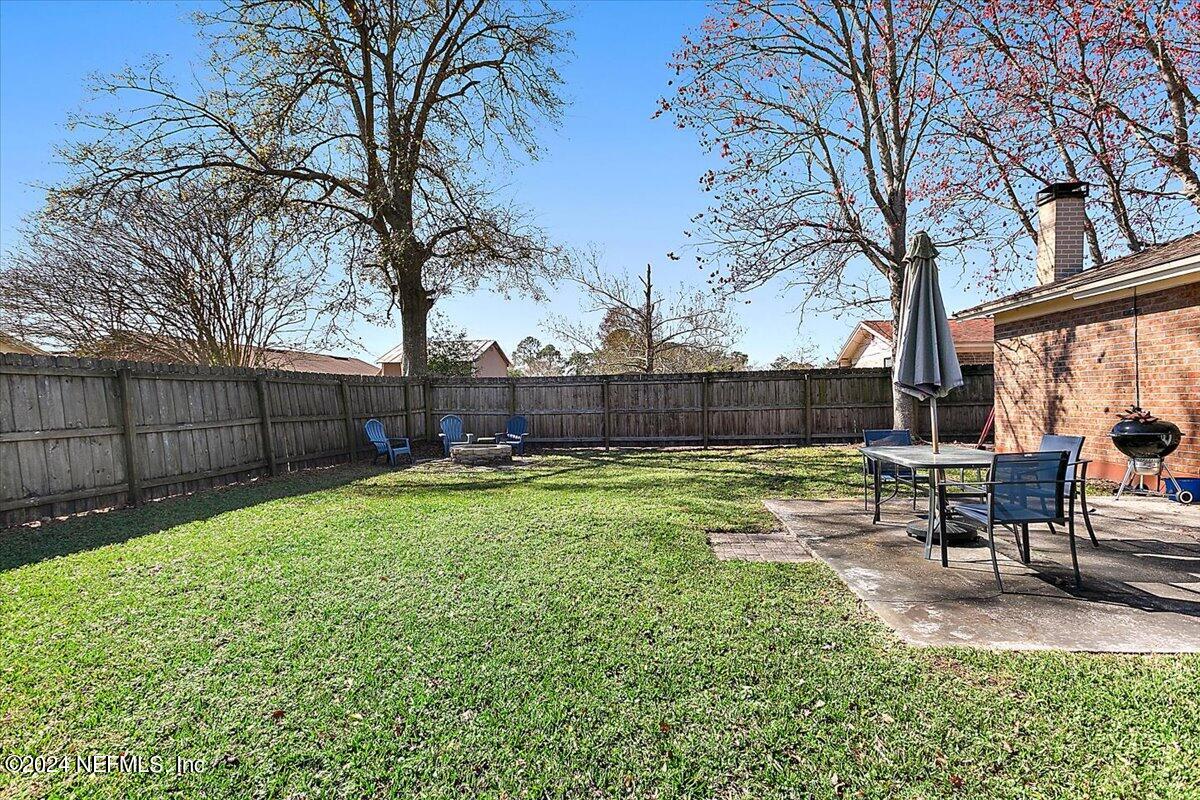 8260 Springtree Road Jacksonville, FL 32210 - Photo 13 of 18 16-Backyard