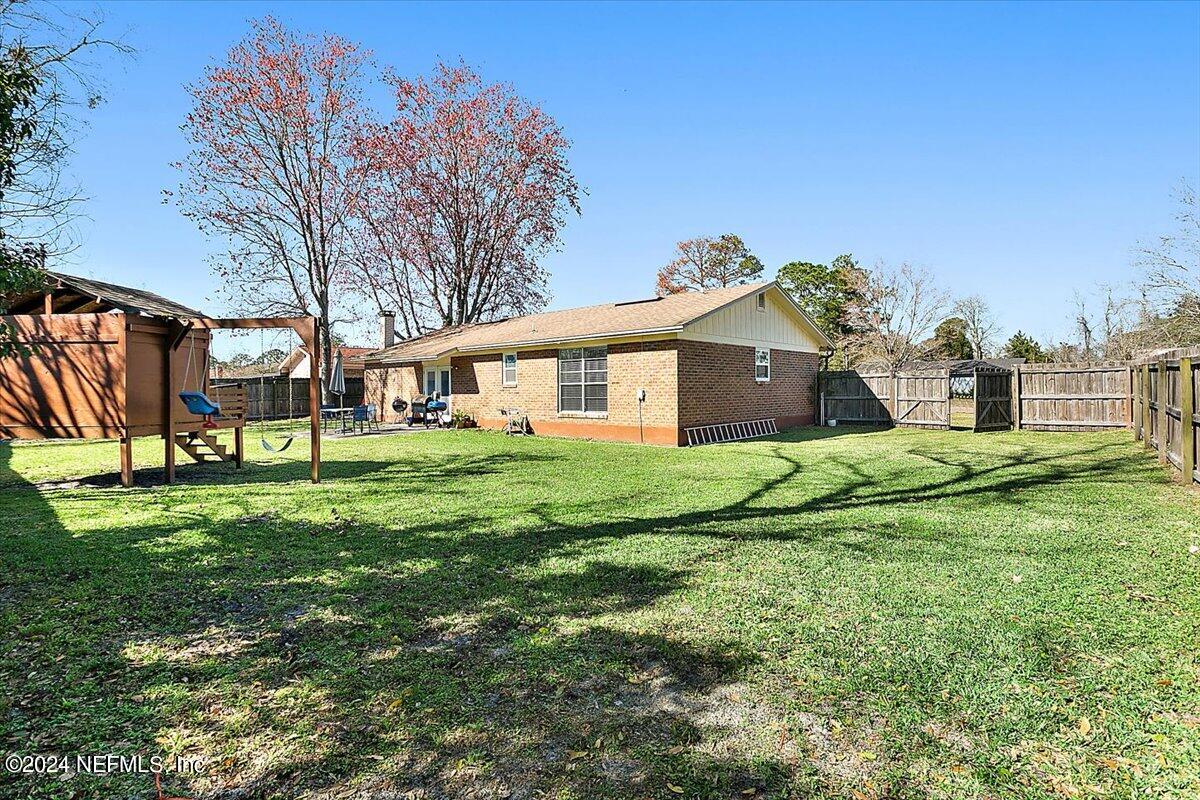 8260 Springtree Road Jacksonville, FL 32210 - Photo 14 of 18 17-Exterior Back