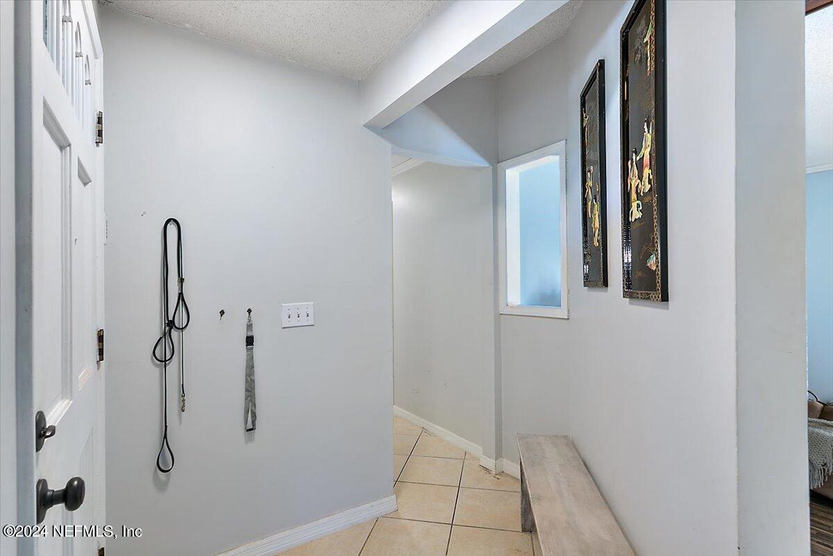 8260 Springtree Road Jacksonville, FL 32210 - Photo 2 of 18 03-Foyer