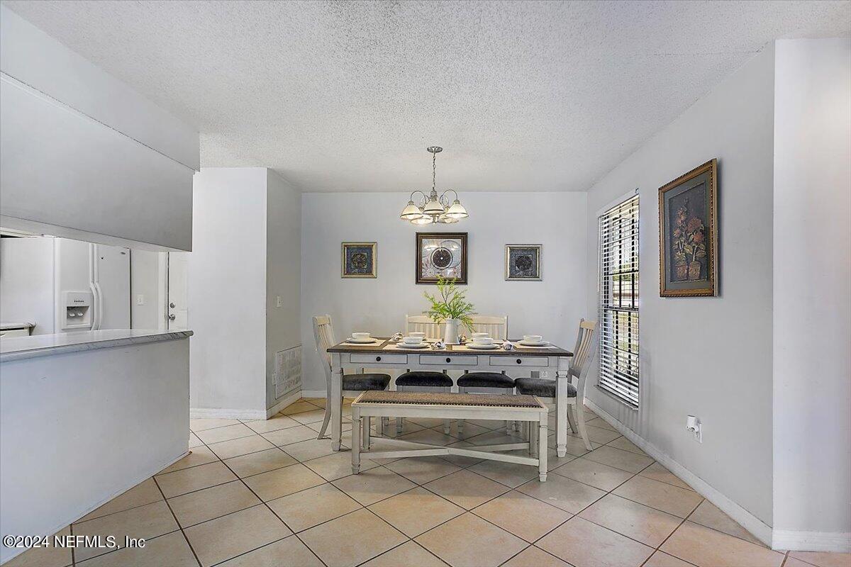 8260 Springtree Road Jacksonville, FL 32210 - Photo 6 of 18 07-Dining Room