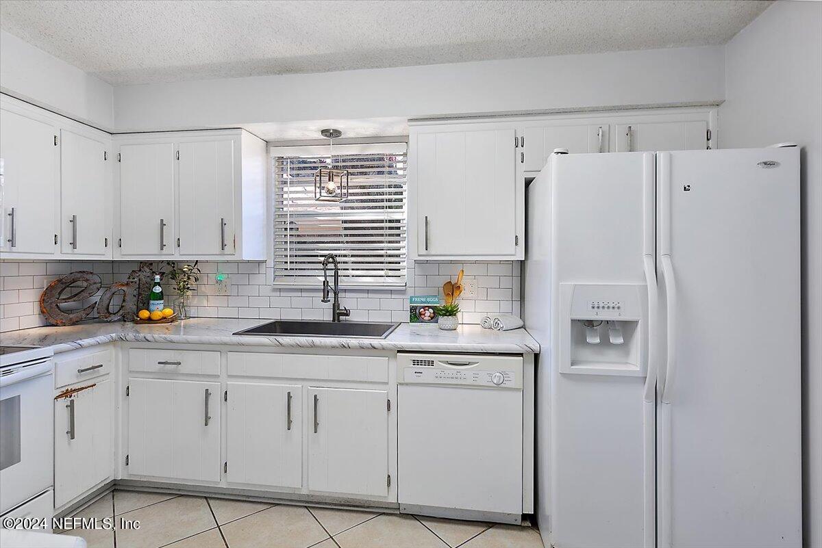 8260 Springtree Road Jacksonville, FL 32210 - Photo 7 of 18 08-Kitchen