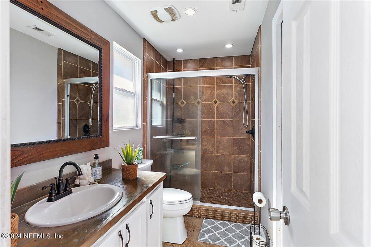8260 Springtree Road Jacksonville, FL 32210 - Photo 9 of 18 11-Primary Bathroom
