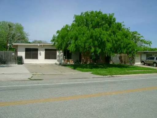 a view of a house with a swimming pool