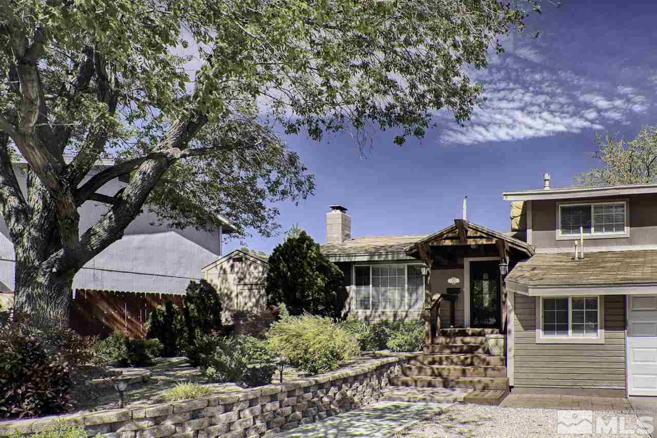 1350 Kirston Street Reno, NV 89503 - Photo 1 of 1 a front view of a house with garden