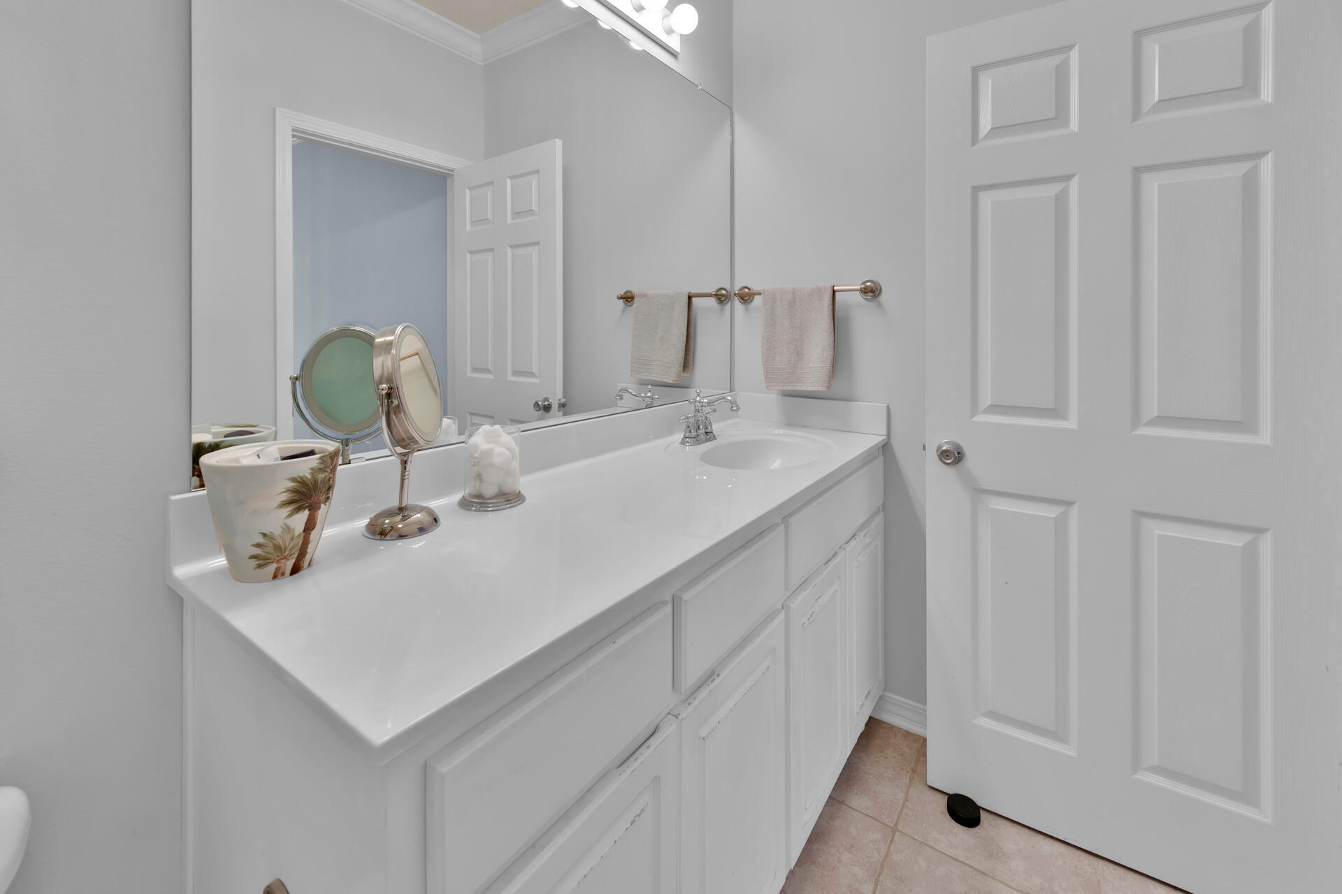 183 Hidden Lake Way Santa Rosa Beach, FL 32459 - Photo 15 of 50 a en suite bathroom with a sink and a mirror