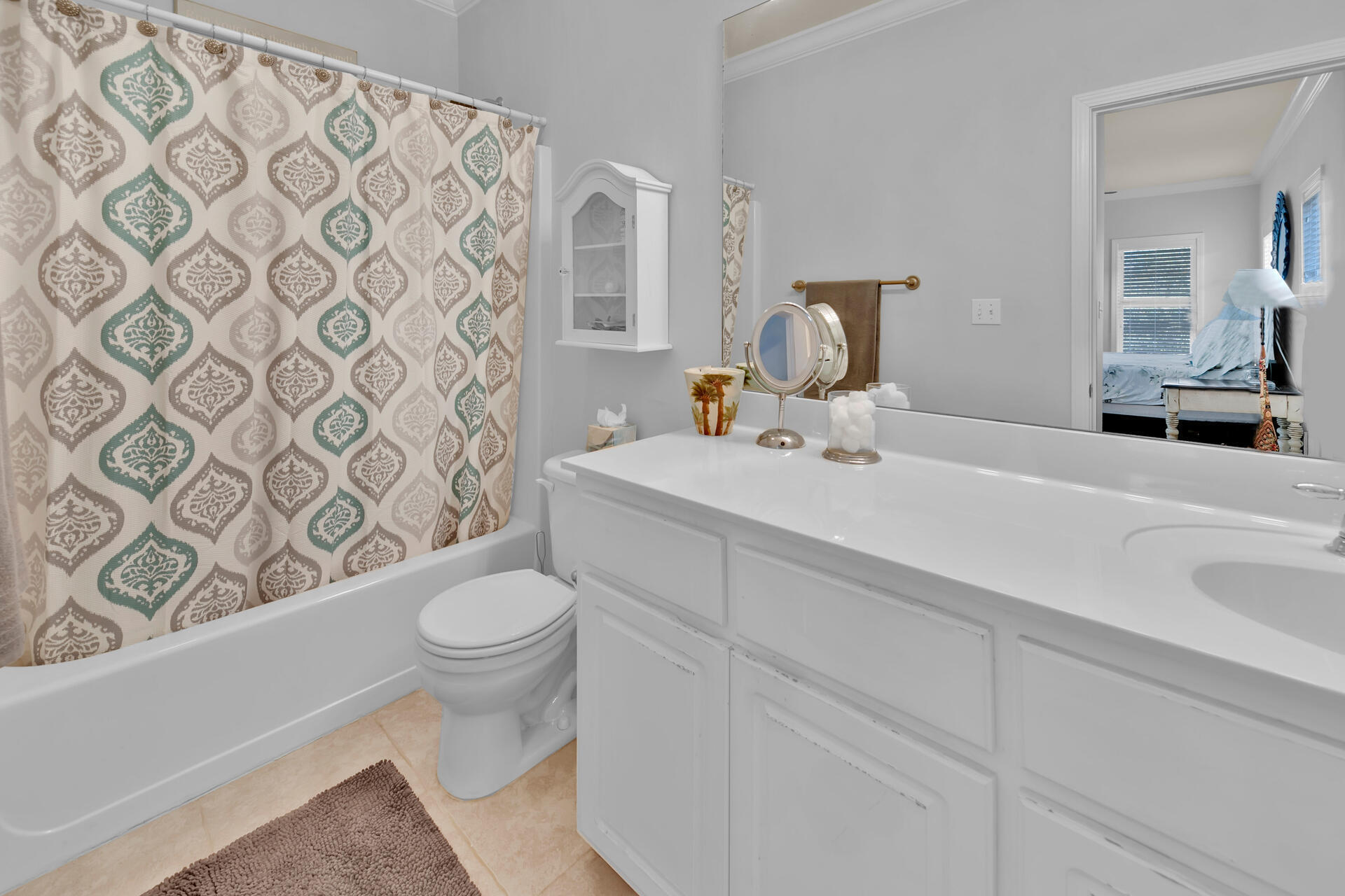 183 Hidden Lake Way Santa Rosa Beach, FL 32459 - Photo 17 of 50 a bathroom with a sink toilet and mirror