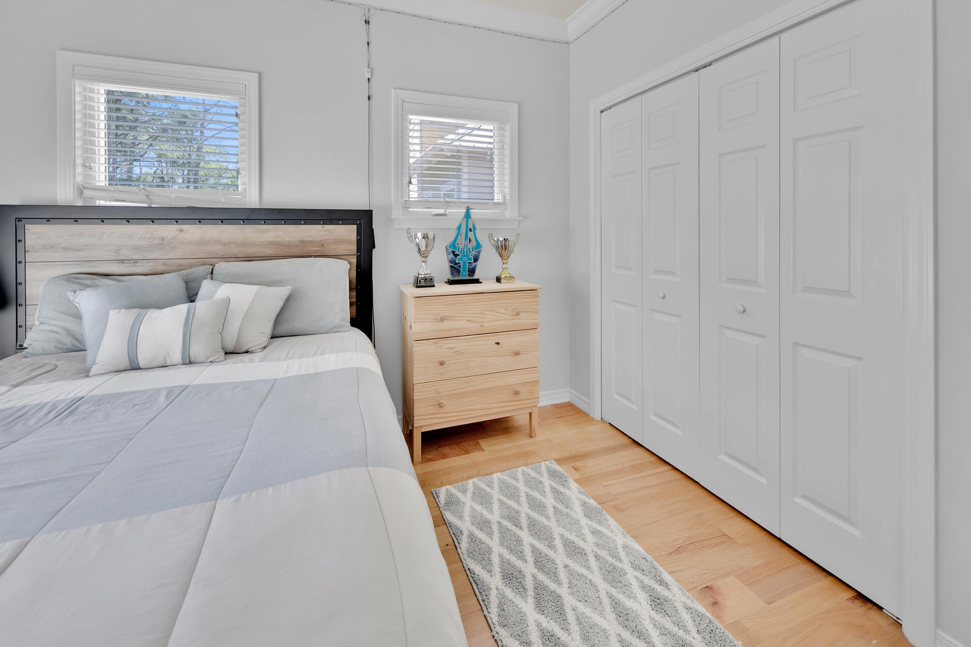 183 Hidden Lake Way Santa Rosa Beach, FL 32459 - Photo 26 of 50 a bedroom with a bed and a window