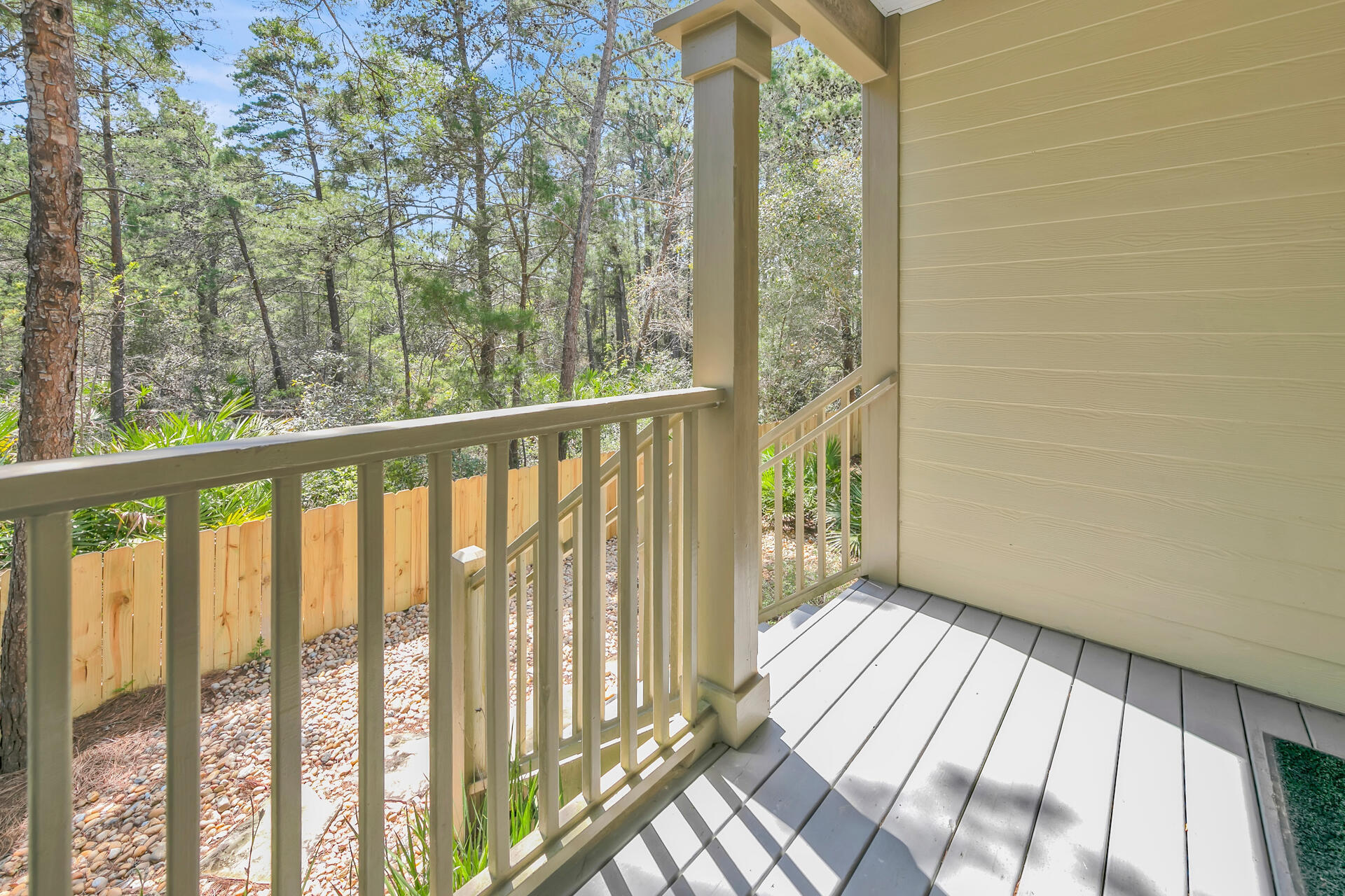 183 Hidden Lake Way Santa Rosa Beach, FL 32459 - Photo 33 of 50 a view of a balcony with wooden floor