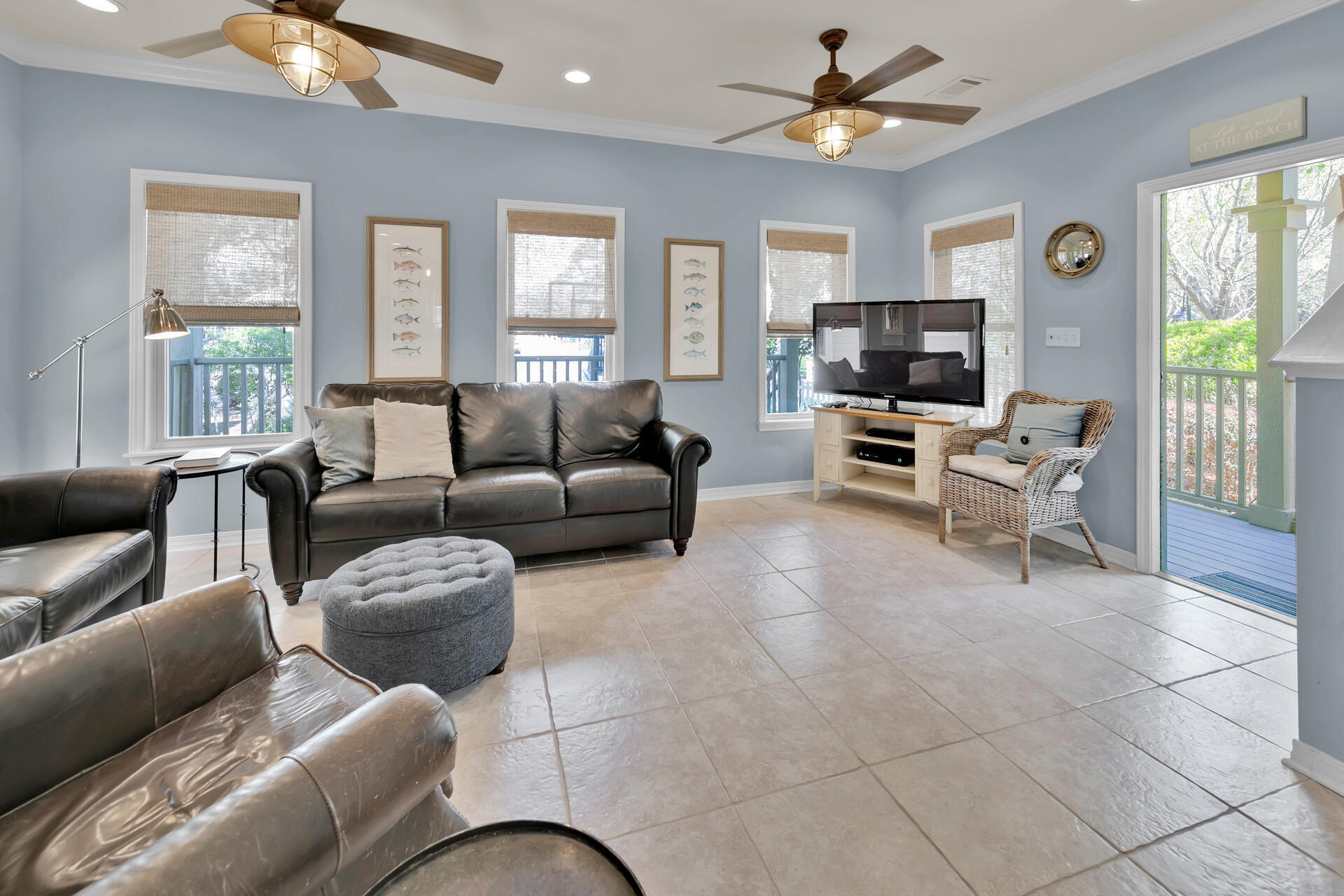 183 Hidden Lake Way Santa Rosa Beach, FL 32459 - Photo 4 of 50 a living room with furniture and a flat screen tv