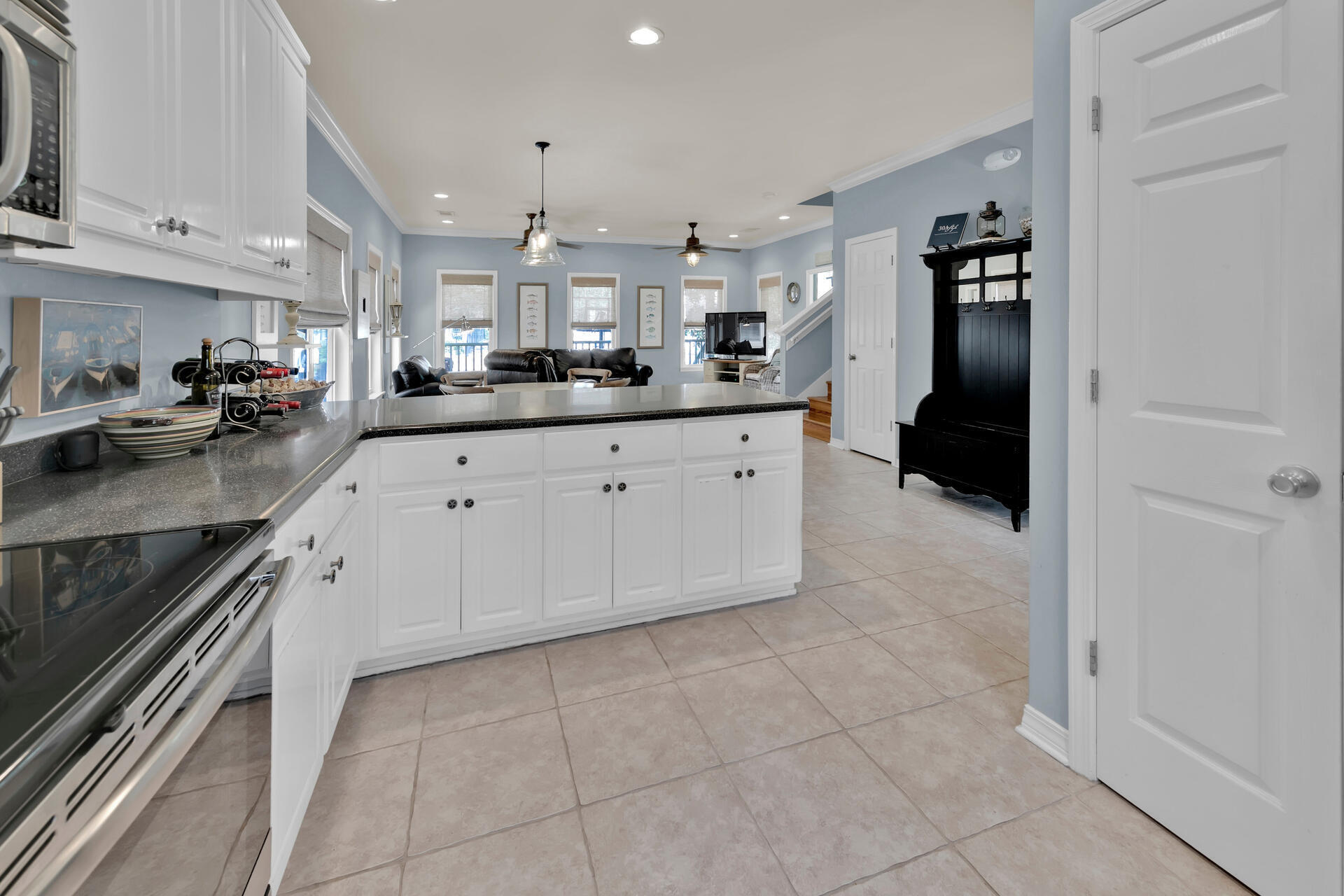 183 Hidden Lake Way Santa Rosa Beach, FL 32459 - Photo 10 of 50 a large kitchen with cabinets and stainless steel appliances