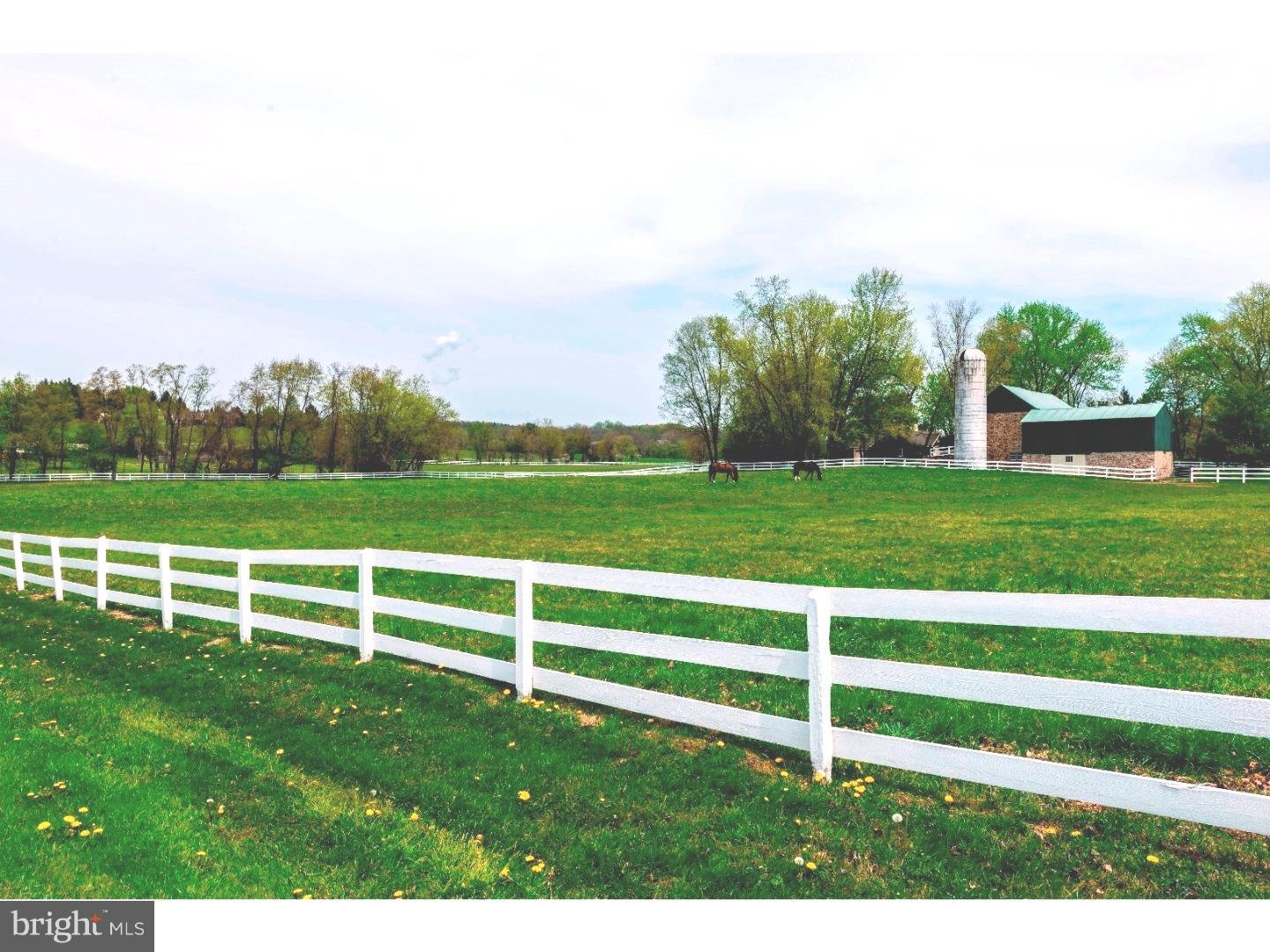 765 Pughtown Road Spring City, PA 19475 - Photo 2 of 21 a view of a yard with wooden fence
