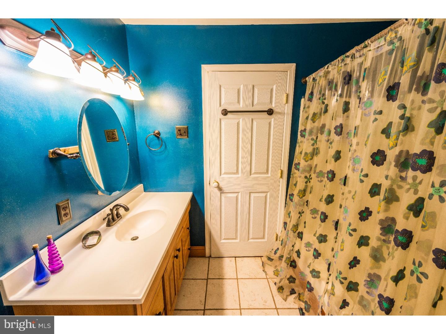 765 Pughtown Road Spring City, PA 19475 - Photo 12 of 21 a bathroom with a sink toilet and shower