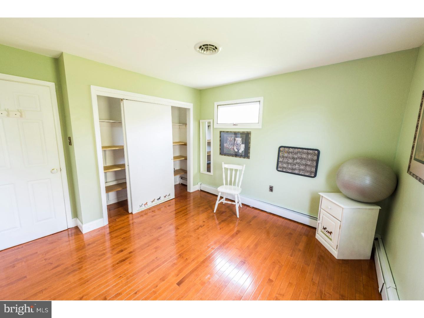 765 Pughtown Road Spring City, PA 19475 - Photo 9 of 21 a living room with furniture and a wooden floor