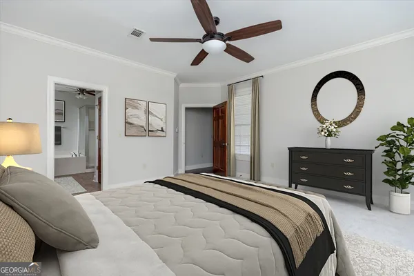 a living room with furniture a rug and a window