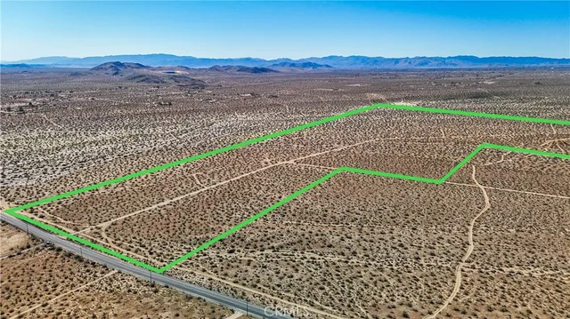 a view of a mountain with a mountain