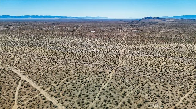 a view of a yard with an outdoor space