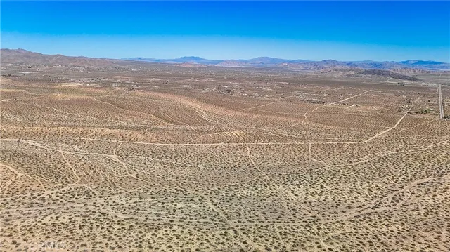 a view of a city with a mountain in the background