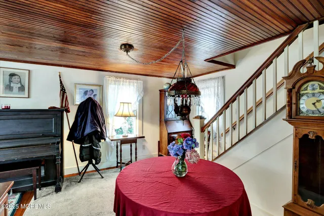 a workspace with furniture and a window