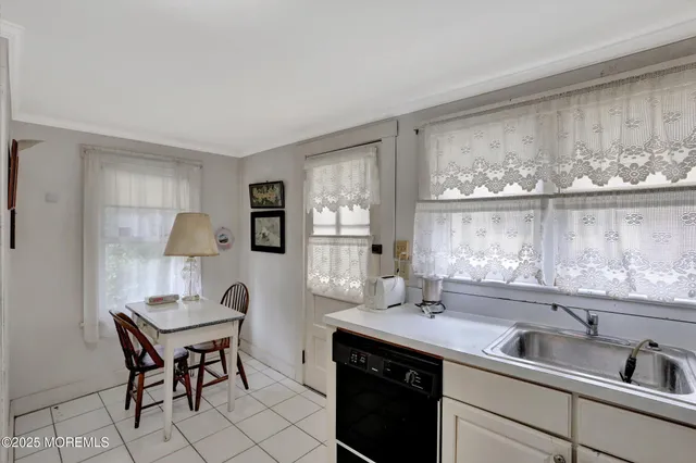 a room with furniture and wooden floor