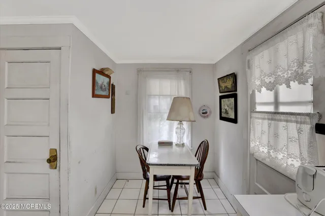 a bathroom with a toilet a sink and tub