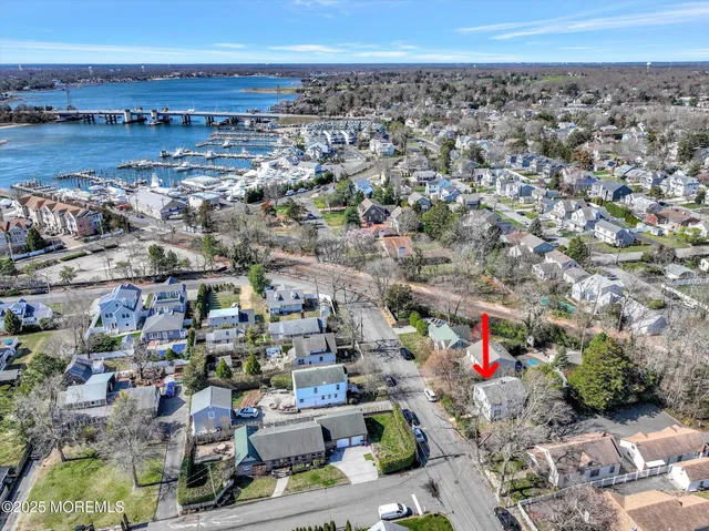 a view of a chairs and table in backyard