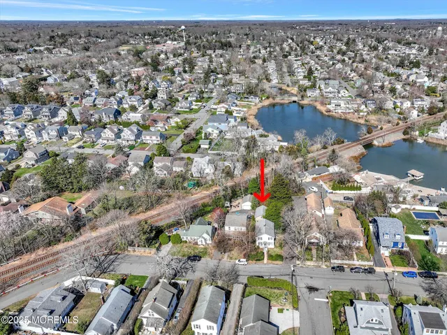 a patio with a patio table and chairs