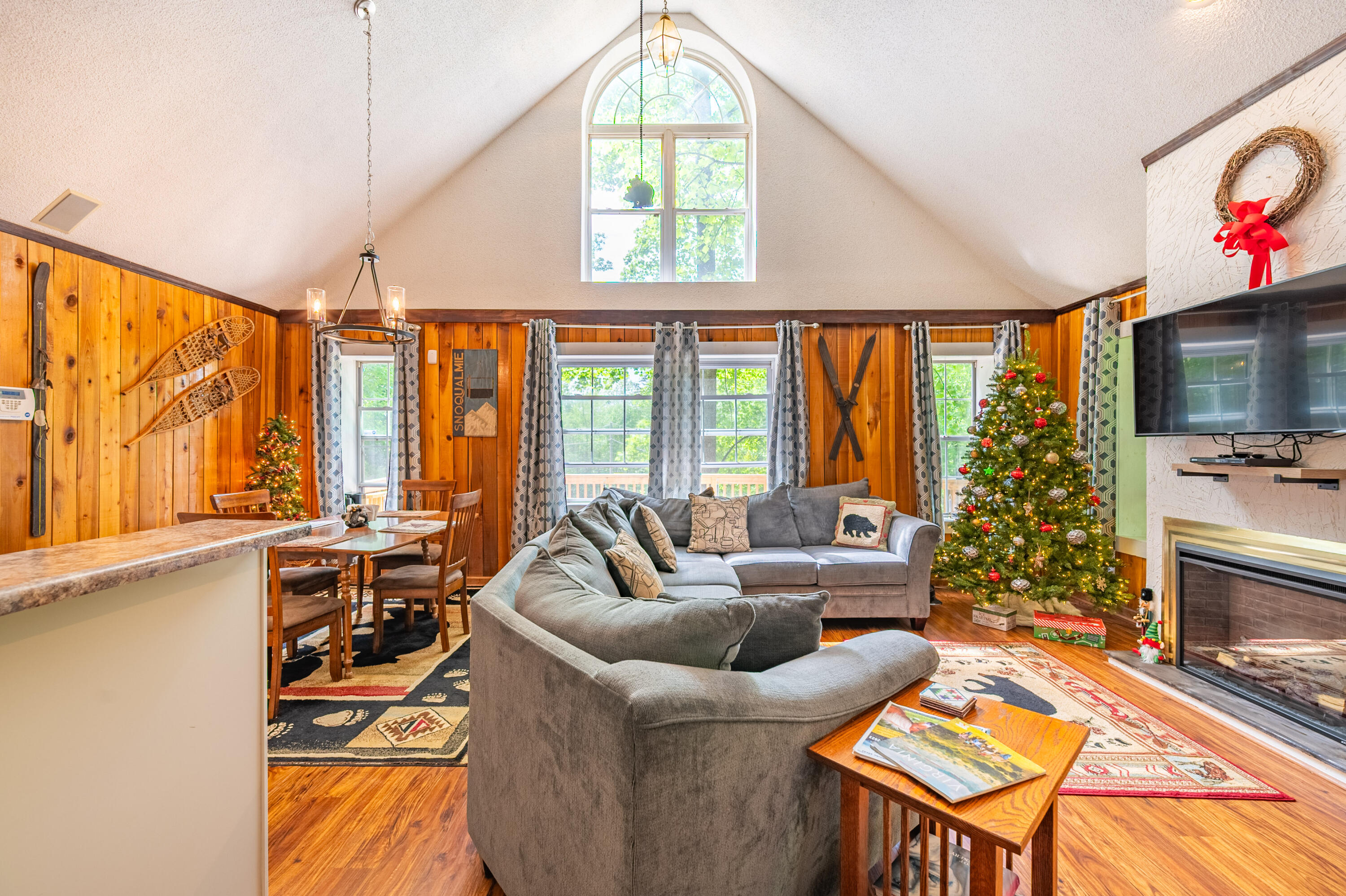 57 Buck Fever Lane Cana, VA 24317 - Photo 11 of 48 a living room with furniture a flat screen tv and a large window