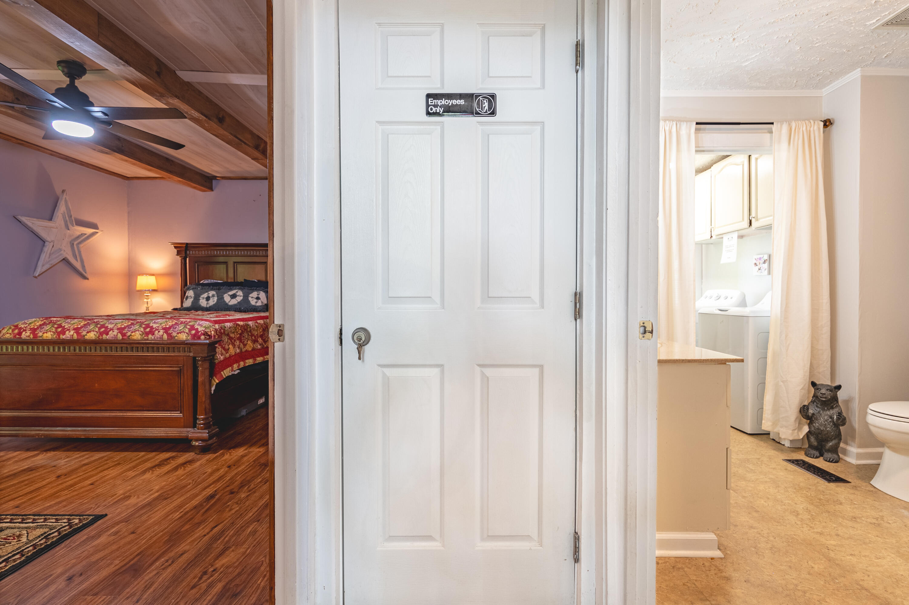 57 Buck Fever Lane Cana, VA 24317 - Photo 23 of 48 a view of a hallway with wooden floor and a cabinet
