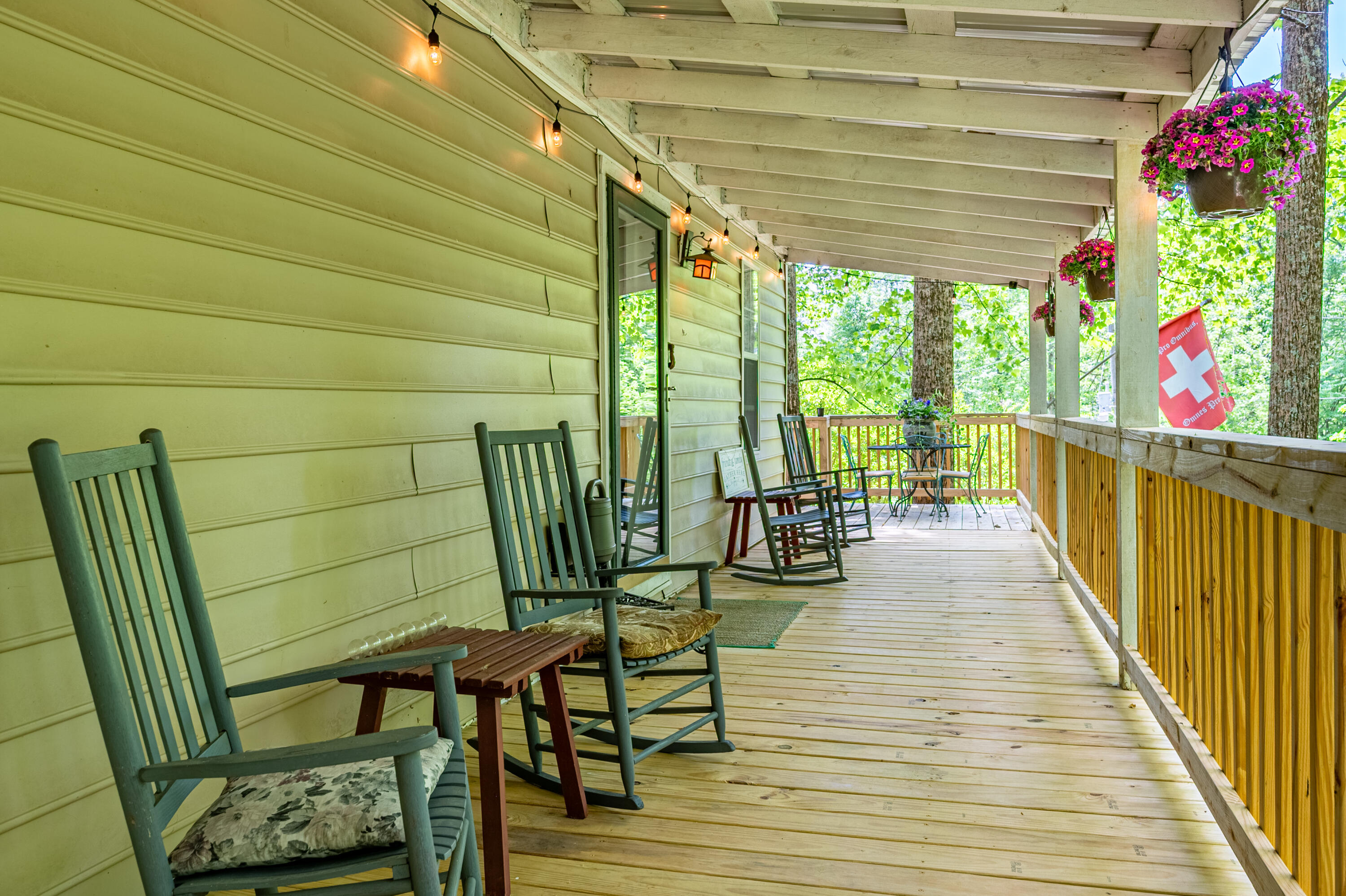 57 Buck Fever Lane Cana, VA 24317 - Photo 6 of 48 a view of a patio with wooden floor and outdoor seating