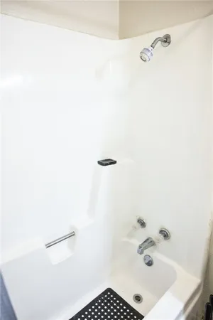 a bathroom with a sink and a shower