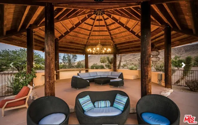 a view of a house with a mountain