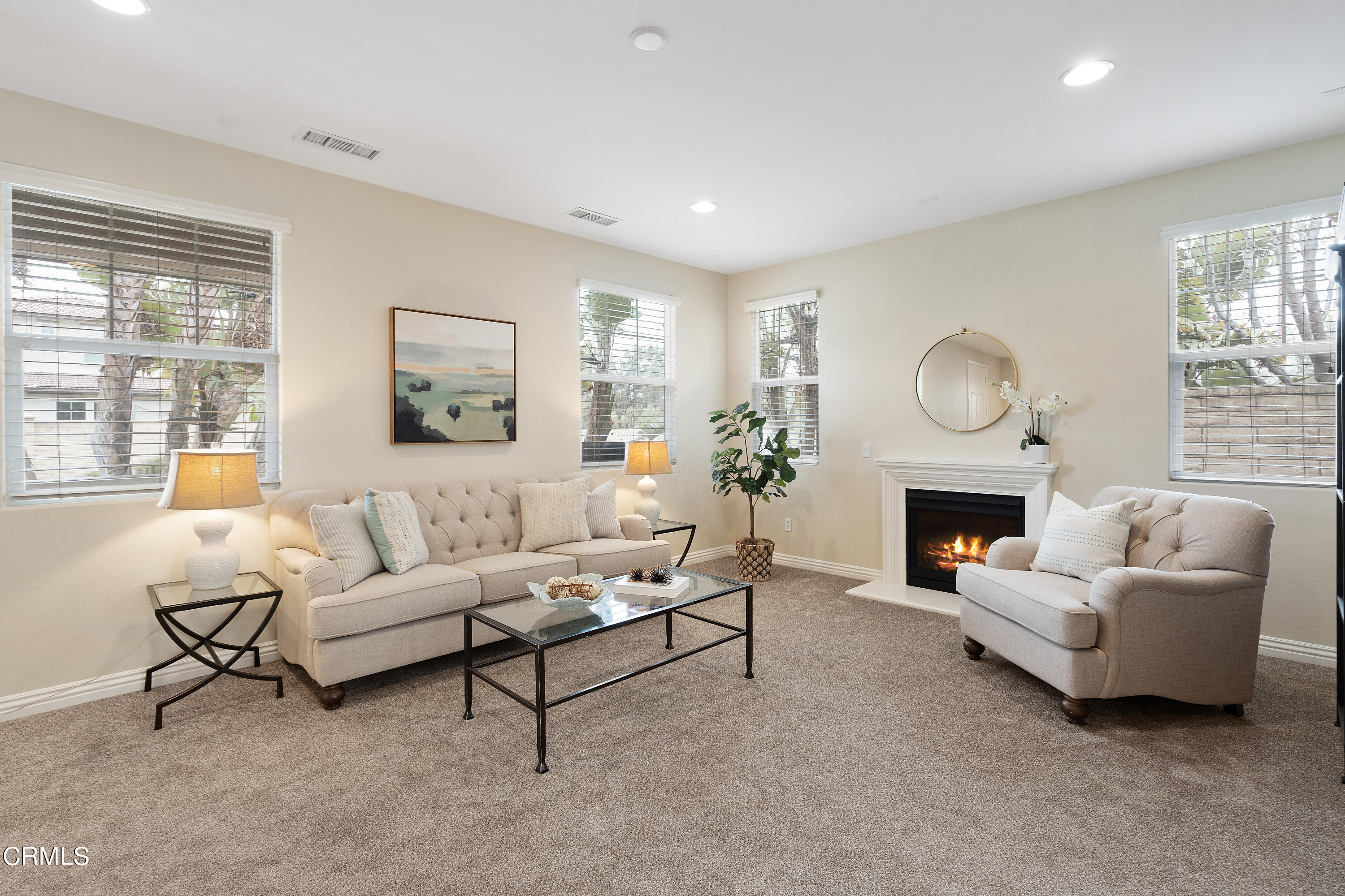 551 Spring Park Road Camarillo, CA 93012 - Photo 3 of 36 a living room with furniture a fireplace and a large window