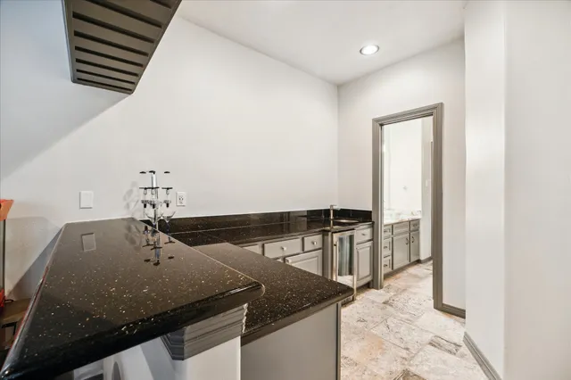 a bathroom with a sink double vanity and a mirror
