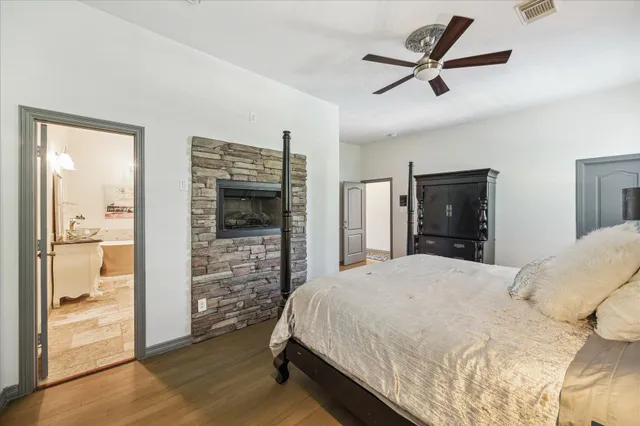 a bathroom with a bathtub and shower