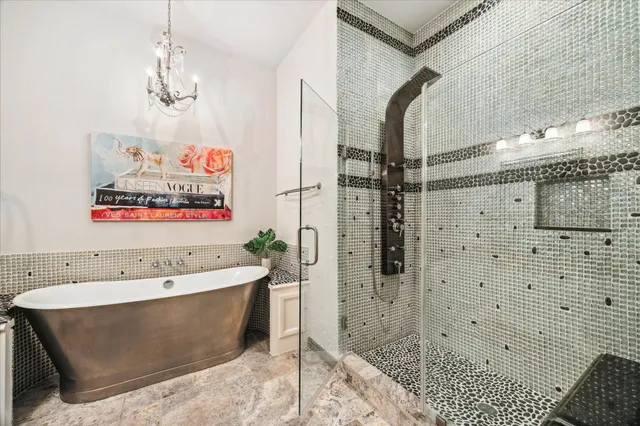 a utility room with sink dryer and washer