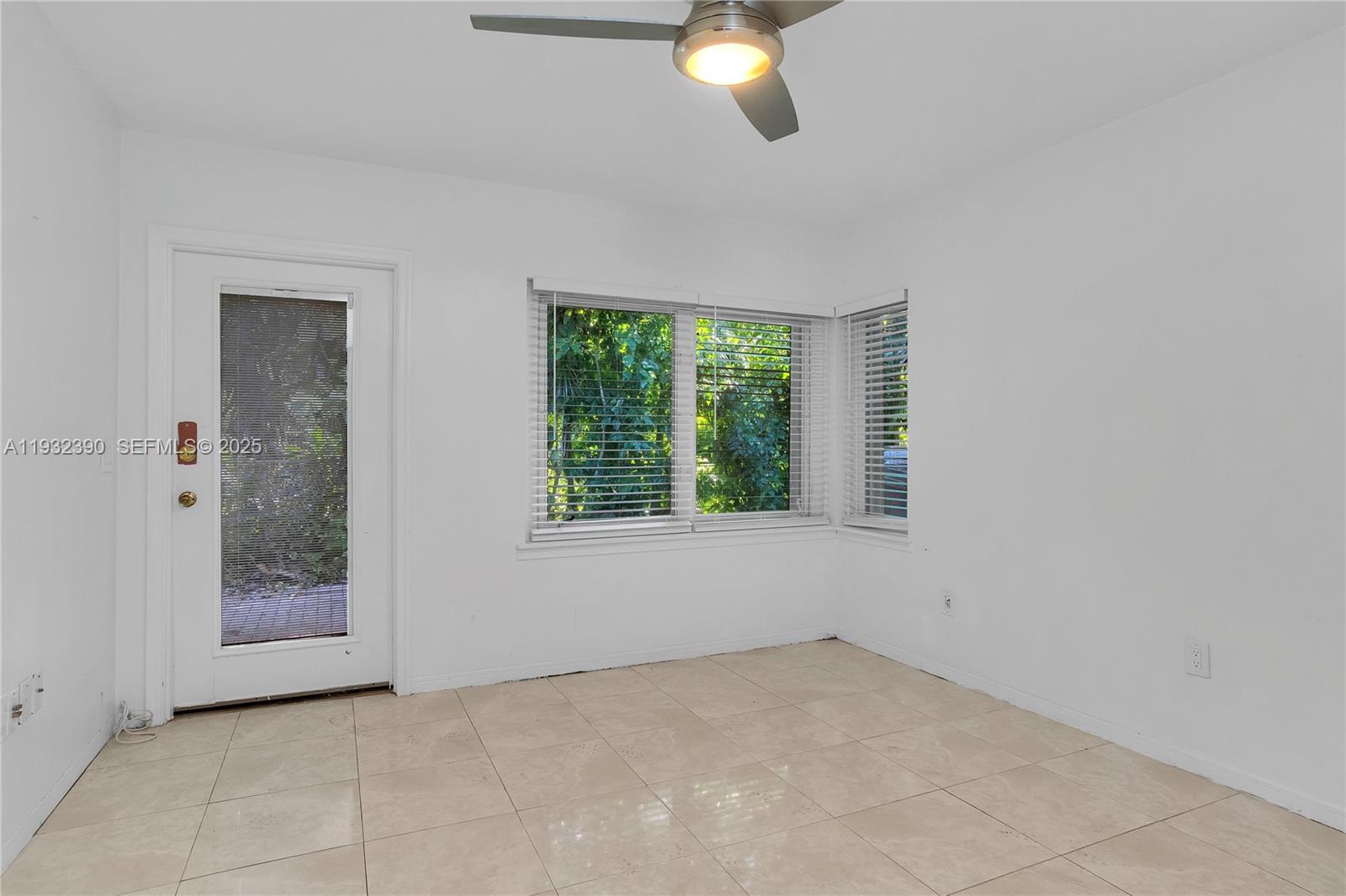 205 Northeast 16th Terrace Fort Lauderdale, FL 33301 - Photo 19 of 21 a view of an empty room with a window
