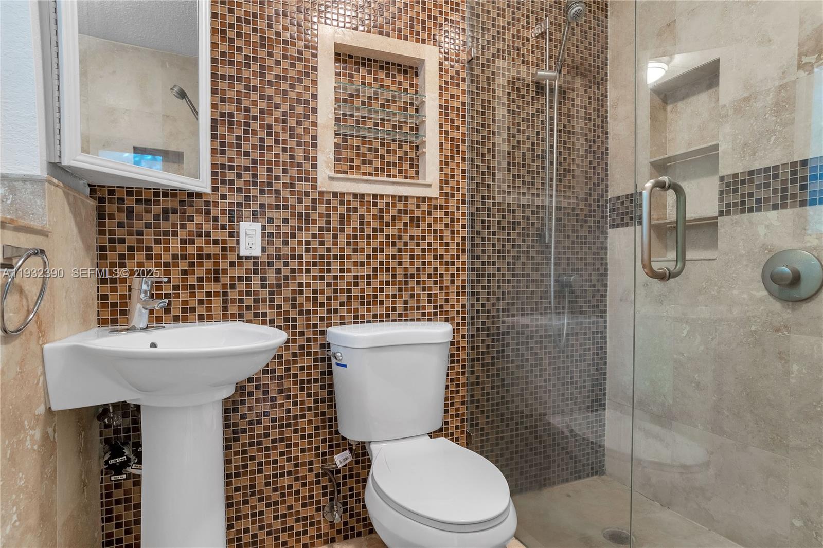 205 Northeast 16th Terrace Fort Lauderdale, FL 33301 - Photo 20 of 21 a bathroom with a sink a toilet and shower