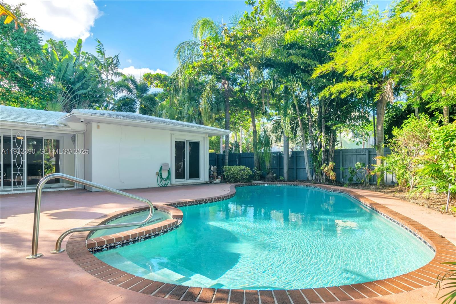 205 Northeast 16th Terrace Fort Lauderdale, FL 33301 - Photo 5 of 21 a view of a house with swimming pool