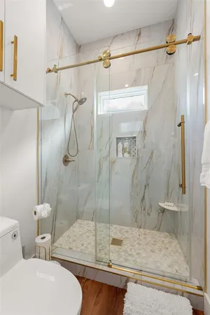 a bathroom with a sink and shower