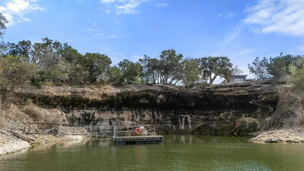 a view of house with ocean view