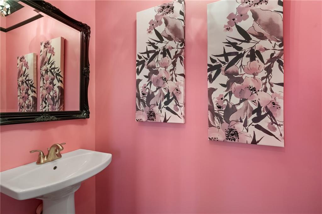 1737 Waterleaf Drive Sewickley, PA 15143 - Photo 12 of 34 a bathroom with a sink and a mirror