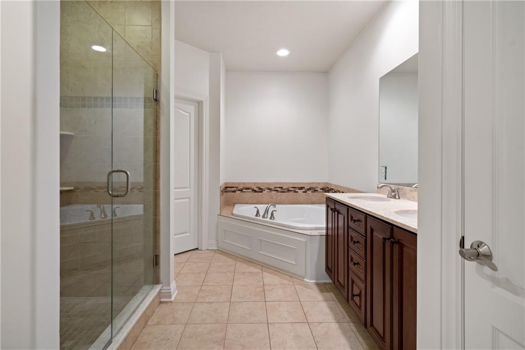 1737 Waterleaf Drive Sewickley, PA 15143 - Photo 16 of 34 a bathroom with a bathtub shower sink and mirror