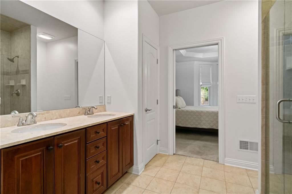 1737 Waterleaf Drive Sewickley, PA 15143 - Photo 17 of 34 a en suite bathroom with a double sink and mirror