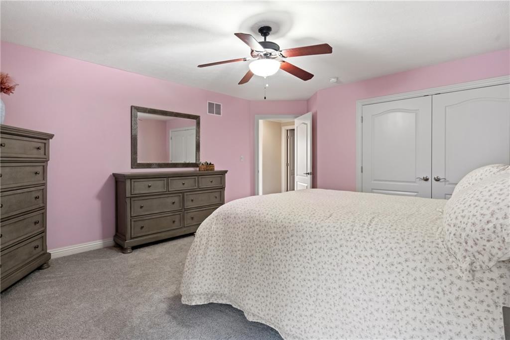 1737 Waterleaf Drive Sewickley, PA 15143 - Photo 18 of 34 a bed room with a bed and a dresser