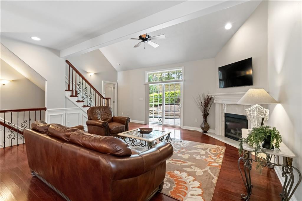 1737 Waterleaf Drive Sewickley, PA 15143 - Photo 3 of 34 a living room with furniture a fireplace and a flat screen tv