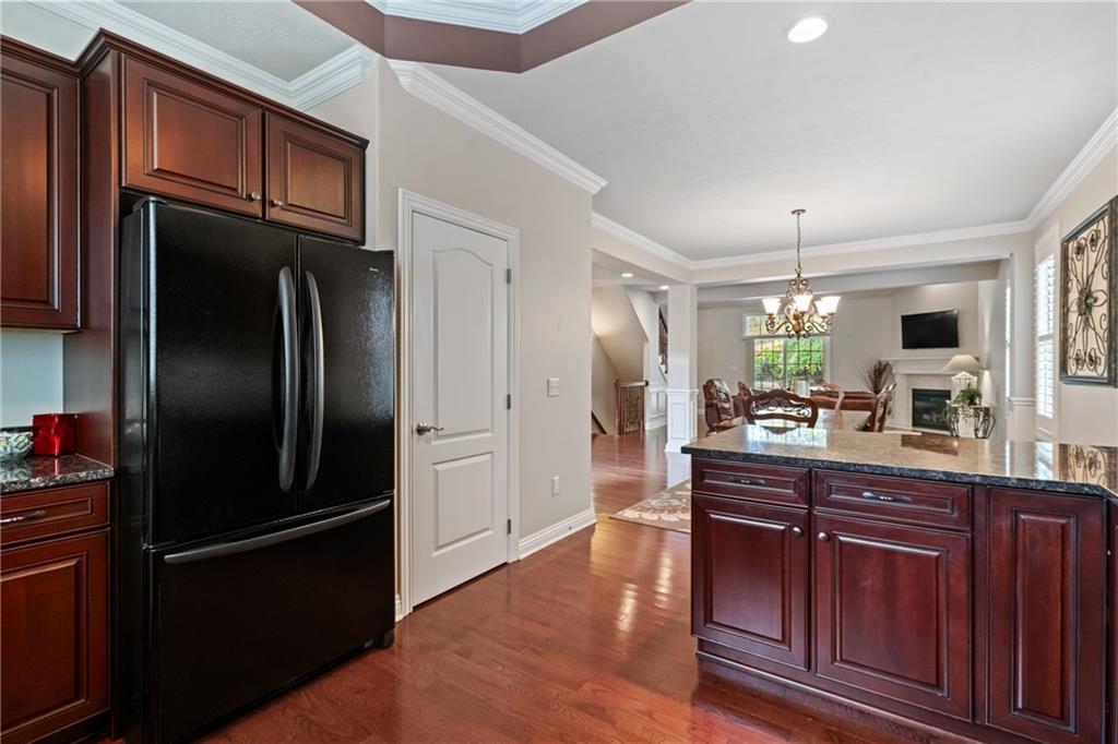 1737 Waterleaf Drive Sewickley, PA 15143 - Photo 7 of 34 a kitchen with stainless steel appliances granite countertop a refrigerator and a sink