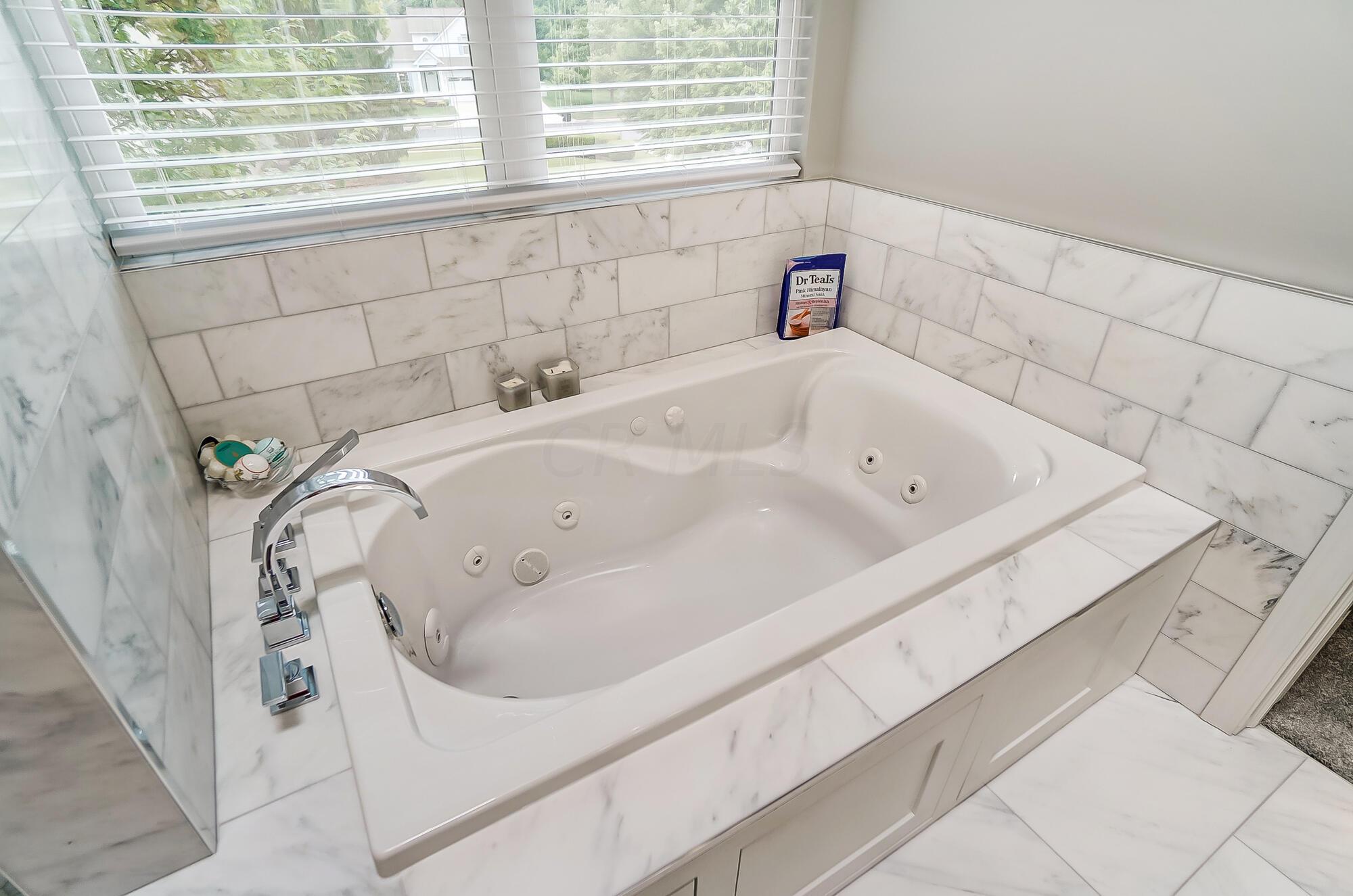 5674 Steward Road Galena, OH 43021 - Photo 55 of 82 New tub, fixtures, tile & window