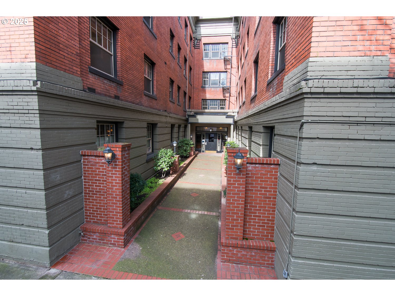 2109 Northwest Irving Street, Unit 407 Portland, OR 97210 - Photo 2 of 17 a view of street with building